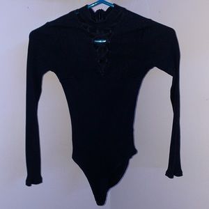 Black ribbed bodysuit, cross top, higher neckline